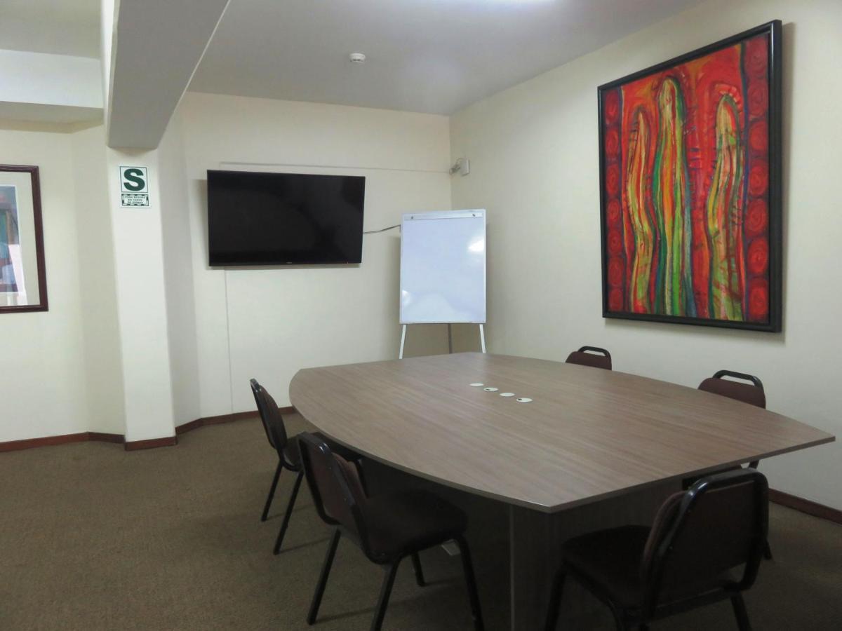 J&A Classic Hotel Lima Exterior foto A meeting room at the University of the Free State